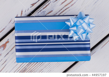 Christmas gift box on wooden background. 44957197