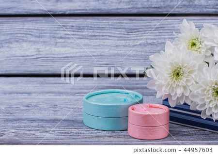 Gift boxes and flowers with copy space. Gift boxes and flowers with copy space. 44957603