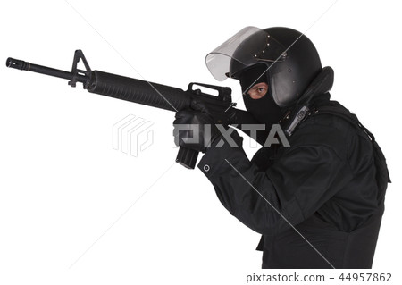 SWAT officer with assault rifle in black uniform SWAT officer with assault rifle in black uniform 44957862