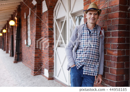 Man in straw hat Man in straw hat 44958185