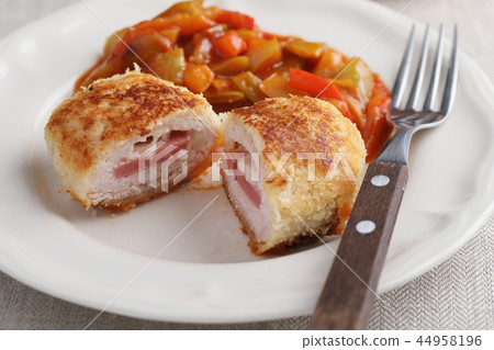 Schnitzel Cordon bleu with vegetables Schnitzel Cordon bleu with vegetables 44958196