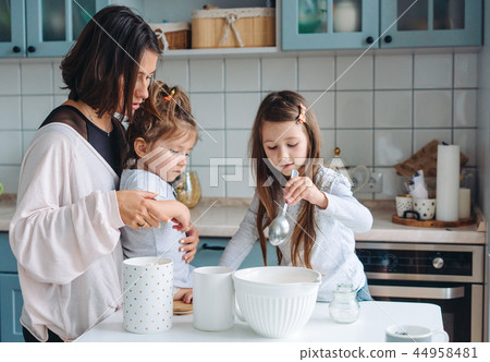 Happy family cook together in the kitchen 44958481