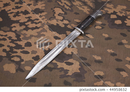 german nazi uniform with hand grenade and bayonet german nazi uniform with hand grenade and bayonet 44958632