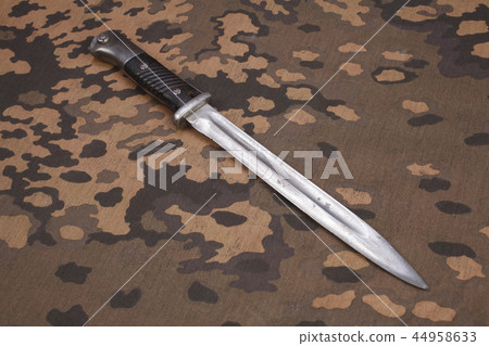 german nazi uniform with hand grenade and bayonet german nazi uniform with hand grenade and bayonet 44958633