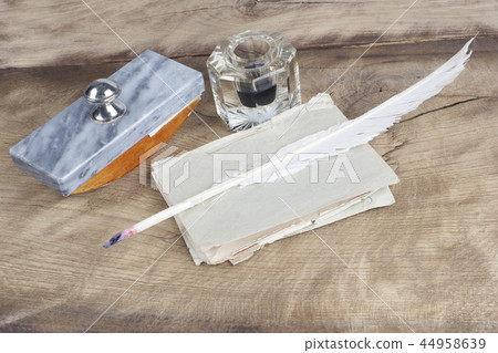 Old fountain pen and inkwell with old letters Old fountain pen and inkwell with old letters 44958639