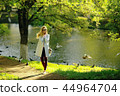 vintage adult girl summer tint / happy adult woman having fun and enjoys summer summertime girl 44964704
