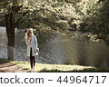 vintage adult girl summer tint / happy adult woman having fun and enjoys summer summertime girl 44964717