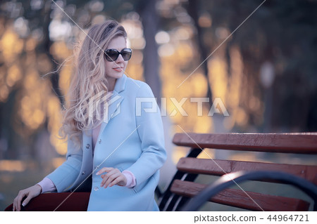 walk in autumn park / beautiful girl in autumn park, model female happiness and fun in yellow trees October walk in autumn park / beautiful girl in autumn park, model female happiness and fun in yellow trees October 44964721