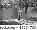 shore pond park adult girl / walk in city park, beautiful girl near pond in urban outdoor recreation area 44964730