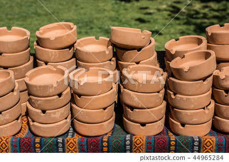 Set of brown ceramic ashtrays Set of brown ceramic ashtrays 44965284