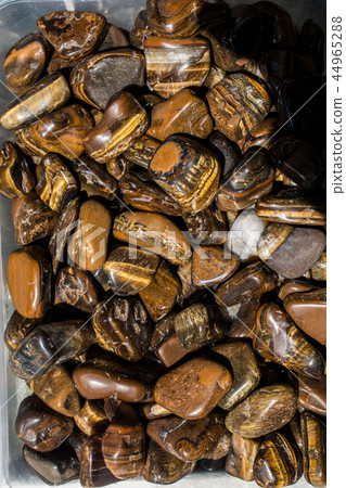 tiger's eye and hawk's eye gemstone 44965288