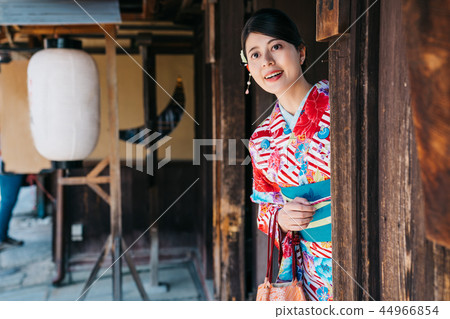 Japanese lady peep from the traditional house 44966854