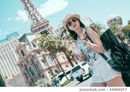 young girl backpacker travel along in Paris. young girl backpacker travel along in Paris. 44966957