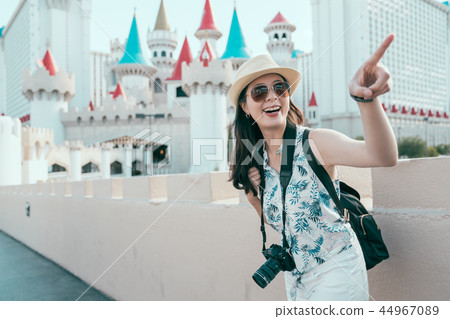 photographer pointing at the beauty of the sky 44967089