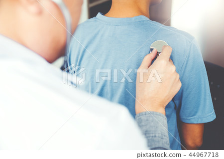 Doctor listening to patients breathing sound Doctor listening to patients breathing sound 44967718