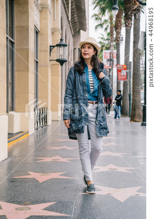 a beautiful lady window shopping a beautiful lady window shopping 44968195