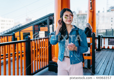 female traveler got off the railcar female traveler got off the railcar 44968357