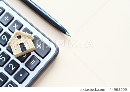 Wood house model on calculator 44968909