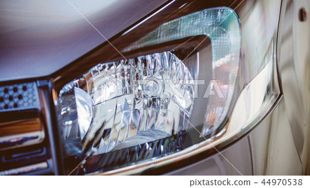 closeup view at modern car headlight. 44970538