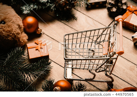 shopping cart and christmas decorations 44970565
