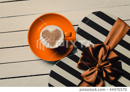 cup of coffee and gift cup of coffee and gift 44970570