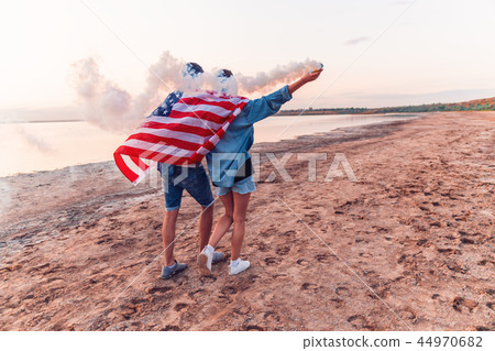 american couple with hand flare or fusee 44970682