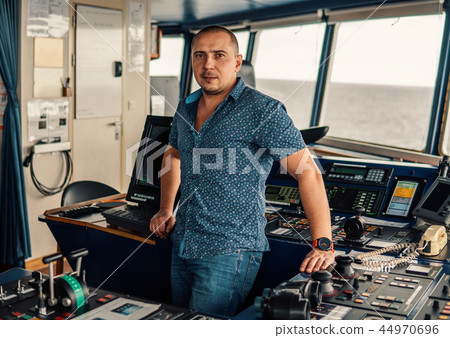 Marine navigational officer or chief mate on navigation watch 44970696