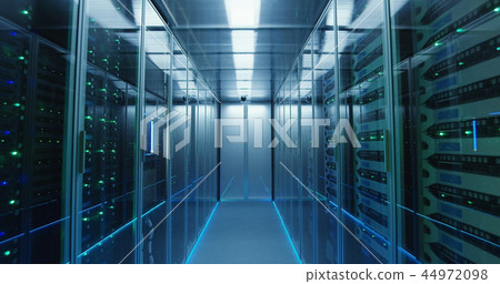 Long hallway full server racks in a modern data center Long hallway full server racks in a modern data center 44972098