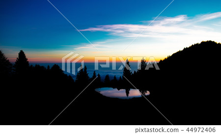After sunset the colors in an alpine landscape  44972406
