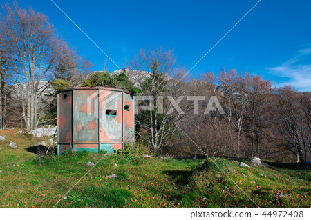 Hunting shed camouflaged in natural colors 44972408