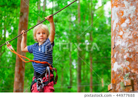 Child in safety harness Child in safety harness 44977688