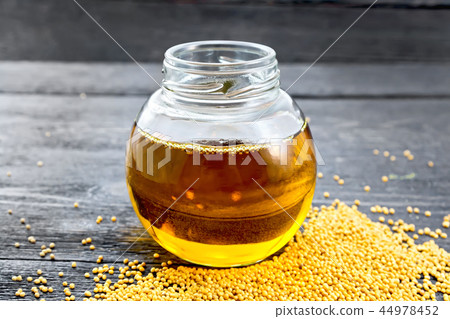 Oil mustard in jar on board 44978452