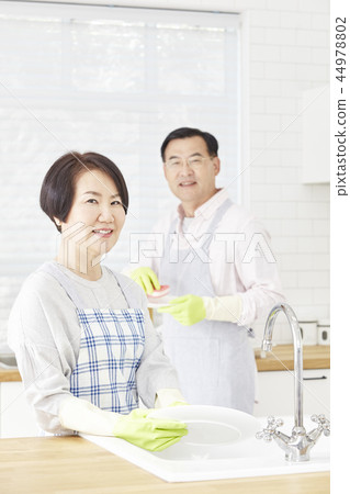Washing dishes, kitchen, couple 44978802