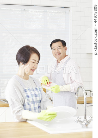 Washing dishes, kitchen, couple 44978809