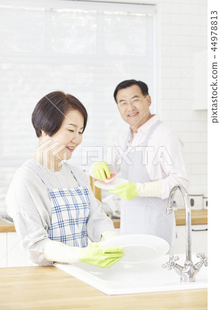 Washing dishes, kitchen, couple 44978813