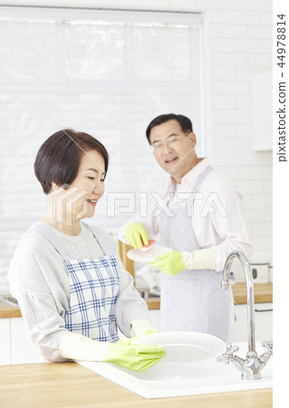 Washing dishes, kitchen, couple 44978814