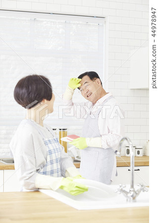 Washing dishes, kitchen, couple 44978947