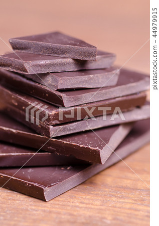 Broken chocolate pieces Broken chocolate pieces 44979915
