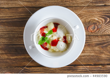 lazy dumplings with sour cream and strawberry jam lazy dumplings with sour cream and strawberry jam 44983590
