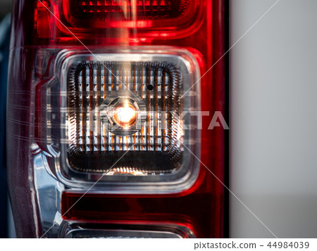 Closeup of a taillight on a truck,turn signal open Closeup of a taillight on a truck,turn signal open 44984039