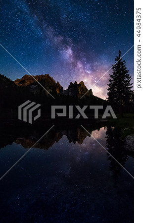 Mliky way reflection over lake Antorno, Italy Mliky way reflection over lake Antorno, Italy 44984375