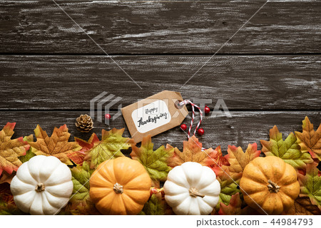 Top view of  Autumn maple leaves with Pumpkin 44984793