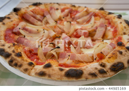 Freshly baked toasted pizza Freshly baked toasted pizza 44985169