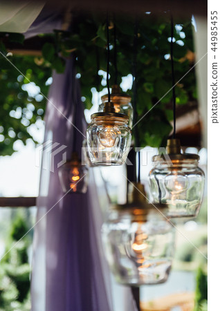 Light bulb decor in outdoor wedding ceremony Light bulb decor in outdoor wedding ceremony 44985455