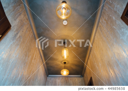 Set edison retro lamp on loft gray concrete background. Set edison retro lamp on loft gray concrete background. 44985638
