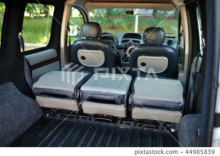 Leather back car seats with active headrest 44985839