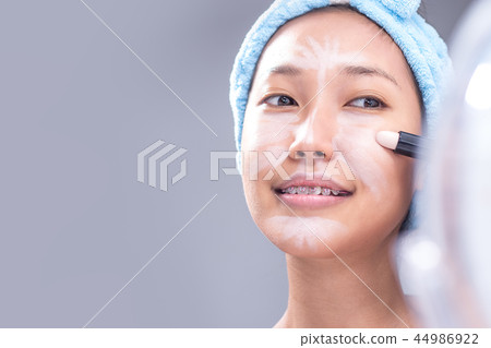 Woman is highlight the face. Woman is highlight the face. 44986922