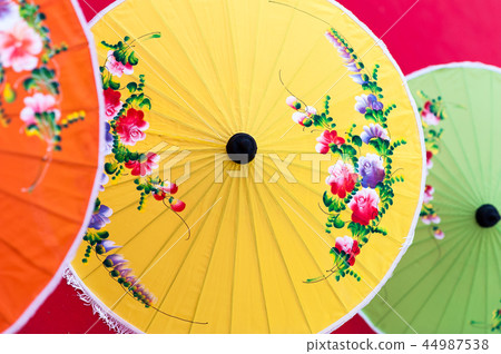 Oriental paper umbrellas of various colors. 44987538