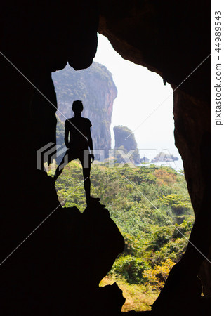 Silhouette of young woman traveller Silhouette of young woman traveller 44989543