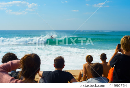People watching surfing contest beach People watching surfing contest beach 44990764